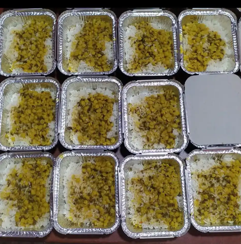 Prepared rice and dal meals ready to be served